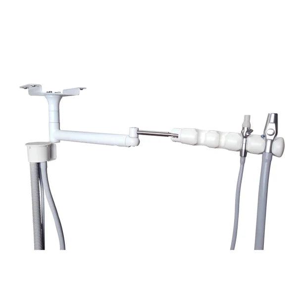 ADS Dental rear assistant vacuum package mounted on dental cabinet, includes vacuum hose and attachments for dental procedures.