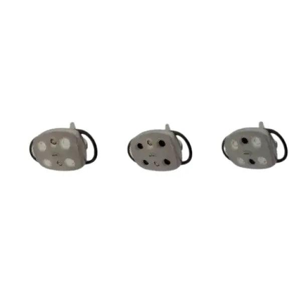 ADS Dental Amber II LED dental light head, whale-shaped LED light with amber color for dental procedures.